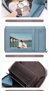 Detail of sky blue leather wallet with accordion card slots and zipper pocket