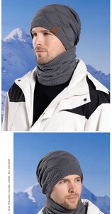 Detailed knit texture and leather logo on grey winter beanie and neck warmer set