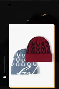 Detailed view of jacquard knitting patterns on blue and burgundy fleece-lined winter beanies