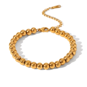 Polished 18k gold beaded ball bracelet with lobster clasp and adjustable extension chain