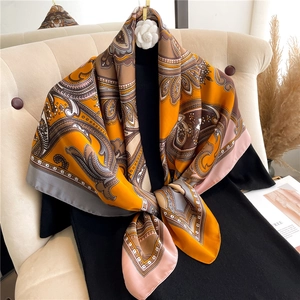 Elegant 90cm silk-feel square scarf with vintage orange and brown paisley patterns