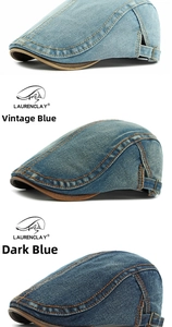 Detail of washed denim flat cap showing adjustable side buckles and stitching