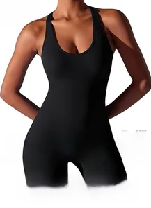 Detail of black seamless backless yoga bodysuit with a sporty racerback design