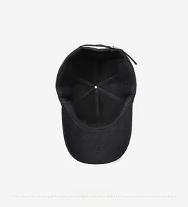 Detailed inner view of black winter baseball cap featuring reinforced seams and sweatband