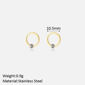Macro shot of gold-plated stainless steel earrings with white zircon measuring 10.5mm