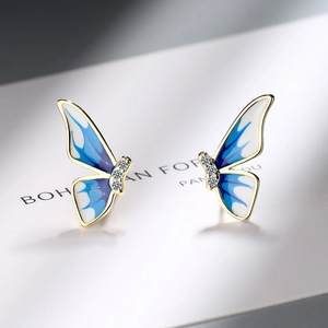 Exquisite gold-plated butterfly stud earrings with blue enamel gradient and cubic zirconia