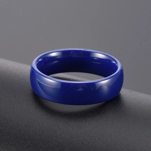 Polished bright blue ceramic ring with minimalist smooth domed surface for men and women
