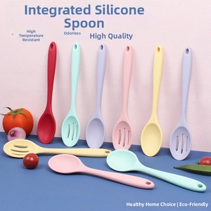 Detail of colorful heat-resistant silicone spoons and slotted ladles for non-stick cookware