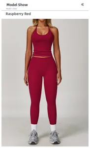 Detailed shot of raspberry red high-waist yoga pants and halter neck fitness top set
