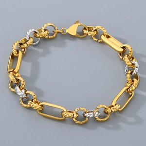 Detail of gold and silver mixed link bracelet with lobster clasp on grey background