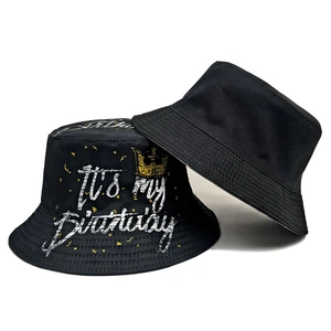 Reversible black bucket hat with Birthday crown print and high-quality cotton texture