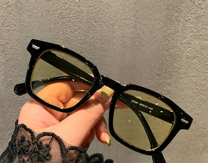 Close-up of square sunglasses with model Z3351 specifications on the inner temple arm