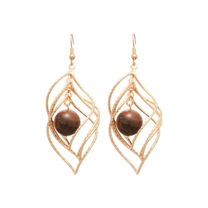 Vintage gold hollow leaf earrings with brown tiger eye stone beads on white background