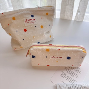 Cute white canvas makeup bag set with colorful polka dots and a portable zipper closure