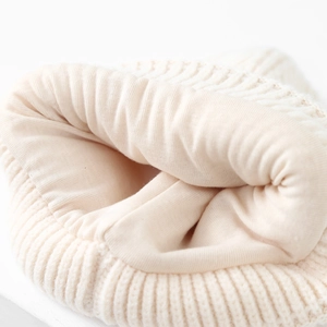 Winter knit hat for kids with cream-white thick yarn and soft warm cotton lining