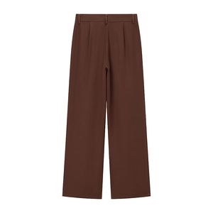 Detail of high-waisted chocolate brown wide-leg trousers with elegant waist belt loops