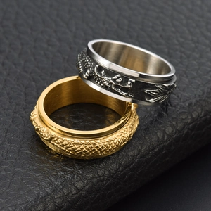 Men's rotatable stainless steel rings with embossed dragon pattern in gold and silver black