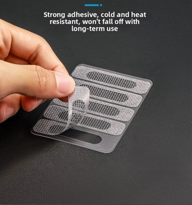 Detailed view of durable mesh screen repair patch with strong heat-resistant adhesive