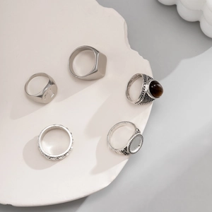 Vintage 5-piece silver alloy ring set with brown gemstone and engraved letter textures