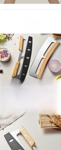 Detail of stainless steel rocker pizza cutter with wooden handles and sharp blade edge