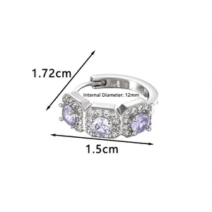 Silver-tone huggie earrings with square purple zircons and white pavé accents