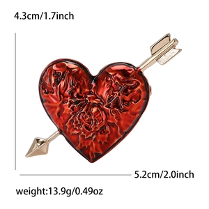 Enamel heart and arrow brooch in red and gold finish with dimensions and weight data
