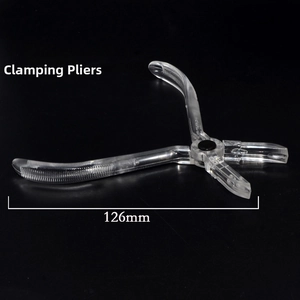 Detailed view of 126mm transparent acrylic piercing clamp with anti-slip textured jaws