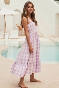 Detail of purple striped tiered midi dress with smocked bodice and elastic spaghetti straps
