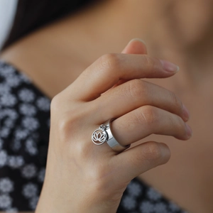 Polished stainless steel ring with delicate hollow lotus flower pendant charm for women