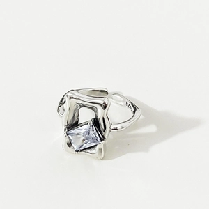 Macro shot of 925 silver ring featuring a rectangle zircon and S925 engraved stamp
