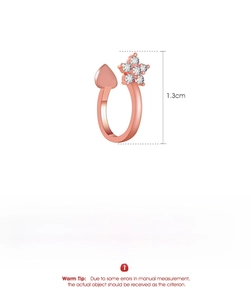 Detail view of star flower ear cuff showing 1.3cm height and copper zircon material