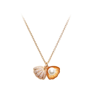 Rose gold seashell necklace with sparkling rhinestones and a white pearl pendant