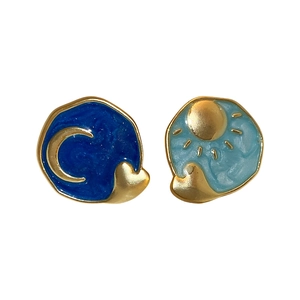 Asymmetric sun and moon enamel heart stud earrings in blue and gold finish for women