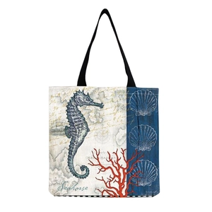 Seahorse and coral print tote bag with vintage nautical map design and black handles