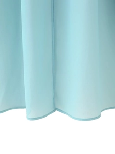 Detailed close-up of light blue chiffon fabric showing drape and rolled hem stitching