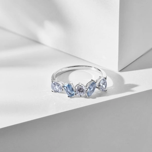 Detail of S925 silver ring featuring blue teardrop and heart-shaped zircon stones