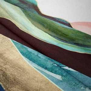 Detailed macro view of abstract landscape tapestry fabric showing mountain prints and texture