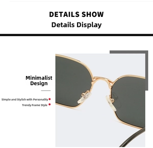 Close-up of golden metal polygonal frame sunglasses with nose pads and dark lenses