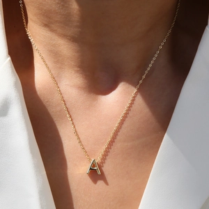 Classic 18k gold initial necklace with dainty letter A pendant on delicate chain