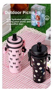 Detail view of portable thermal bottles with bow and daisy patterns on a picnic mat