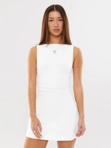 Detail view of white Y2K mini dress featuring side ruching and a slim fit sleeveless design