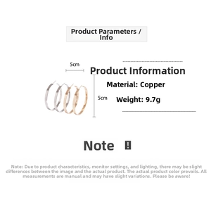 Detailed view of 5cm polished geometric hoop earrings in gold and silver finish
