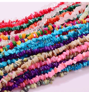 Macro view of colorful natural crushed crystal and agate stones for DIY jewelry making