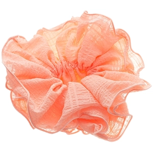 Elegant peach pink ruffled fabric scrunchie with soft chiffon texture and frilly edges