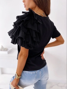 Detail of layered ruffle short sleeves on a minimalist black crewneck T-shirt for women