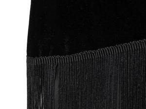 Close-up of black velvet dress fabric featuring dense and fine long fringe hem detail