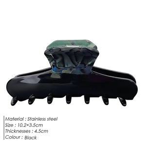 Elegant large black acetate hair claw clip with green marble pattern and 10.2cm length