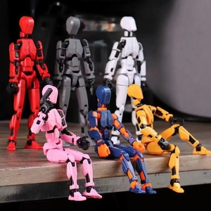 3D printed multi-jointed action figure set with movable limbs in various vibrant colors