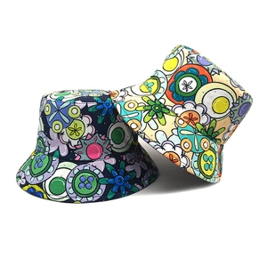 Floral print bucket hats for sun protection in navy blue and beige patterned canvas