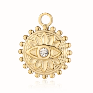 Macro detail of golden evil eye pendant with center zircon and petal texture